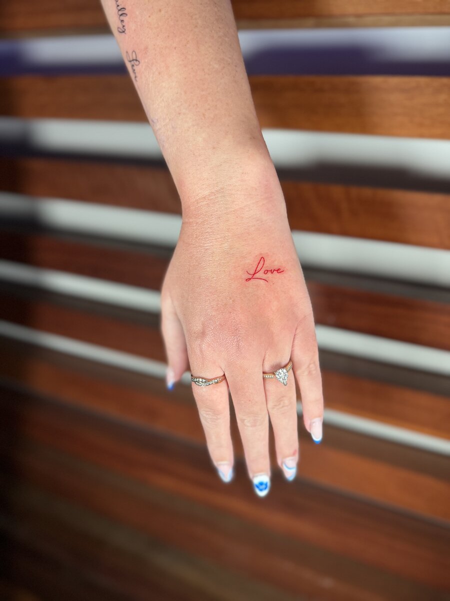 Fine line geometric tattoo by tattoo artist Coolangatta